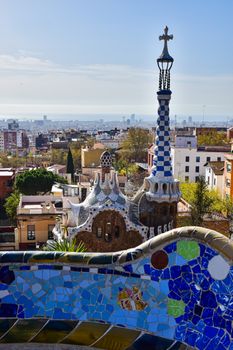 Explore the vibrant architecture and cityscape views from Park Güell in Barcelona, Spain.