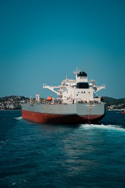 Free A large oil tanker moves through the ocean, showcasing international transportation and logistics. Stock Photo