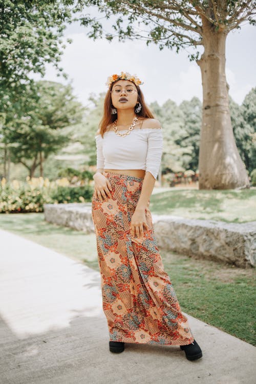 Woman Wearing White Off-Shoulder Crop Top