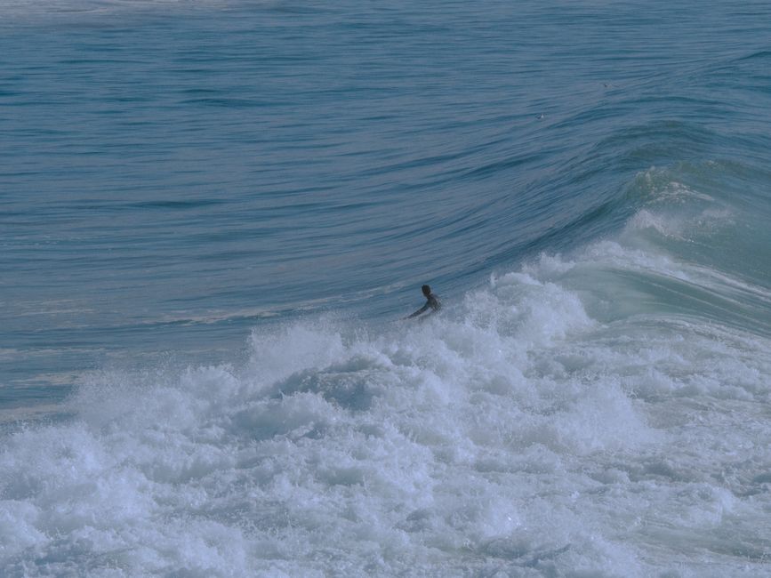 Catch the thrill of surfing in Taghazout's majestic waves. Ideal for adventure and travel seekers.