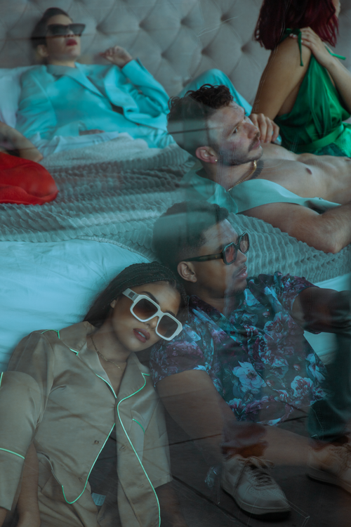 Free Group of stylish individuals relaxing, showcasing modern fashion in Ciudad de México. Stock Photo