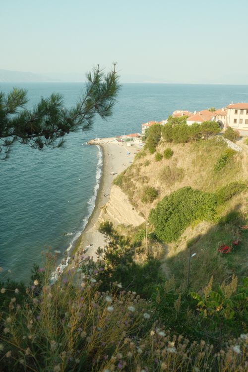 Free Tranquil coastal landscape with cliffs and clear blue waters in summer. Stock Photo