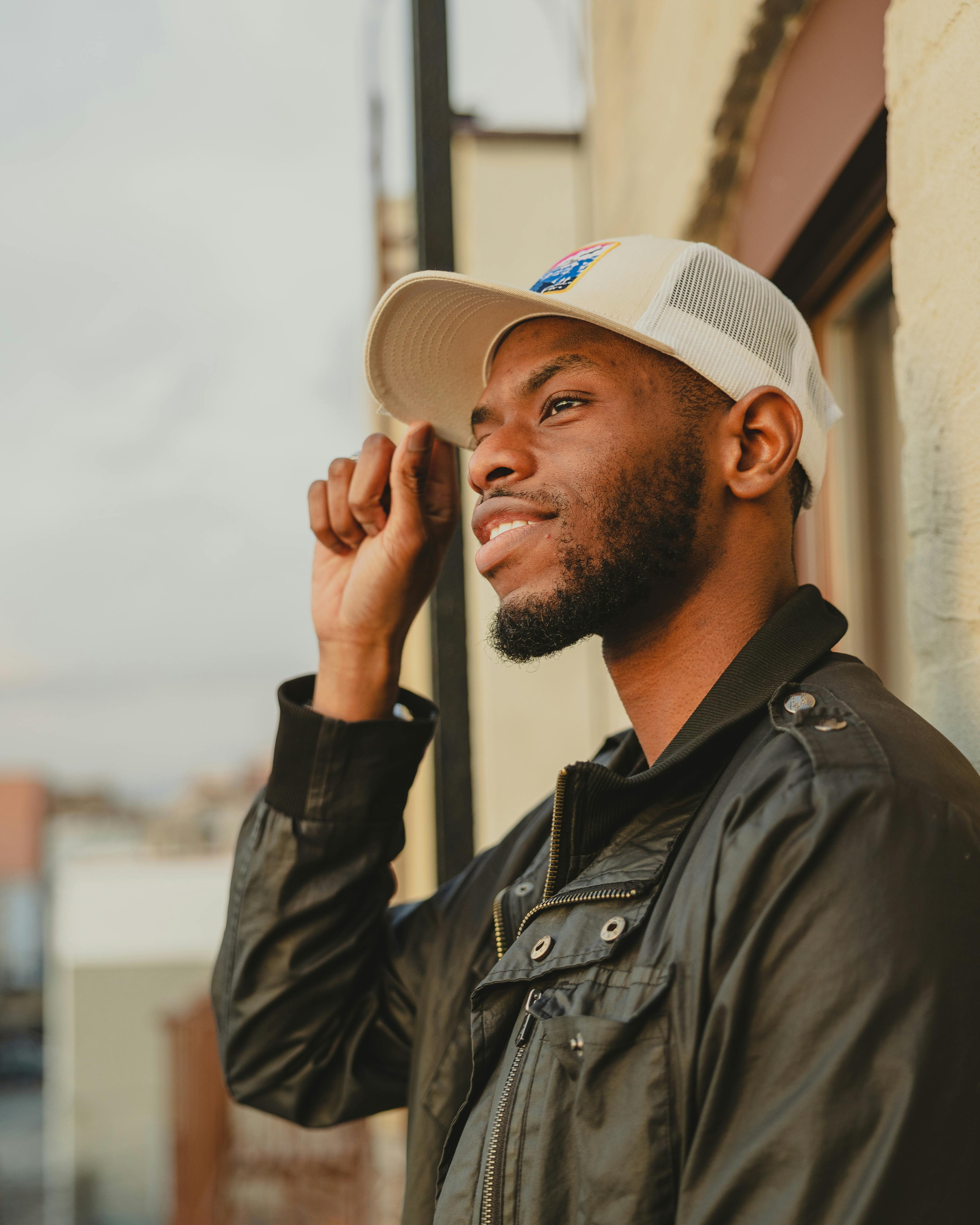 portrait of an african man wearing cap