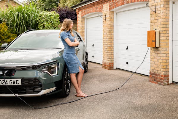 Charging electric car in the sun
