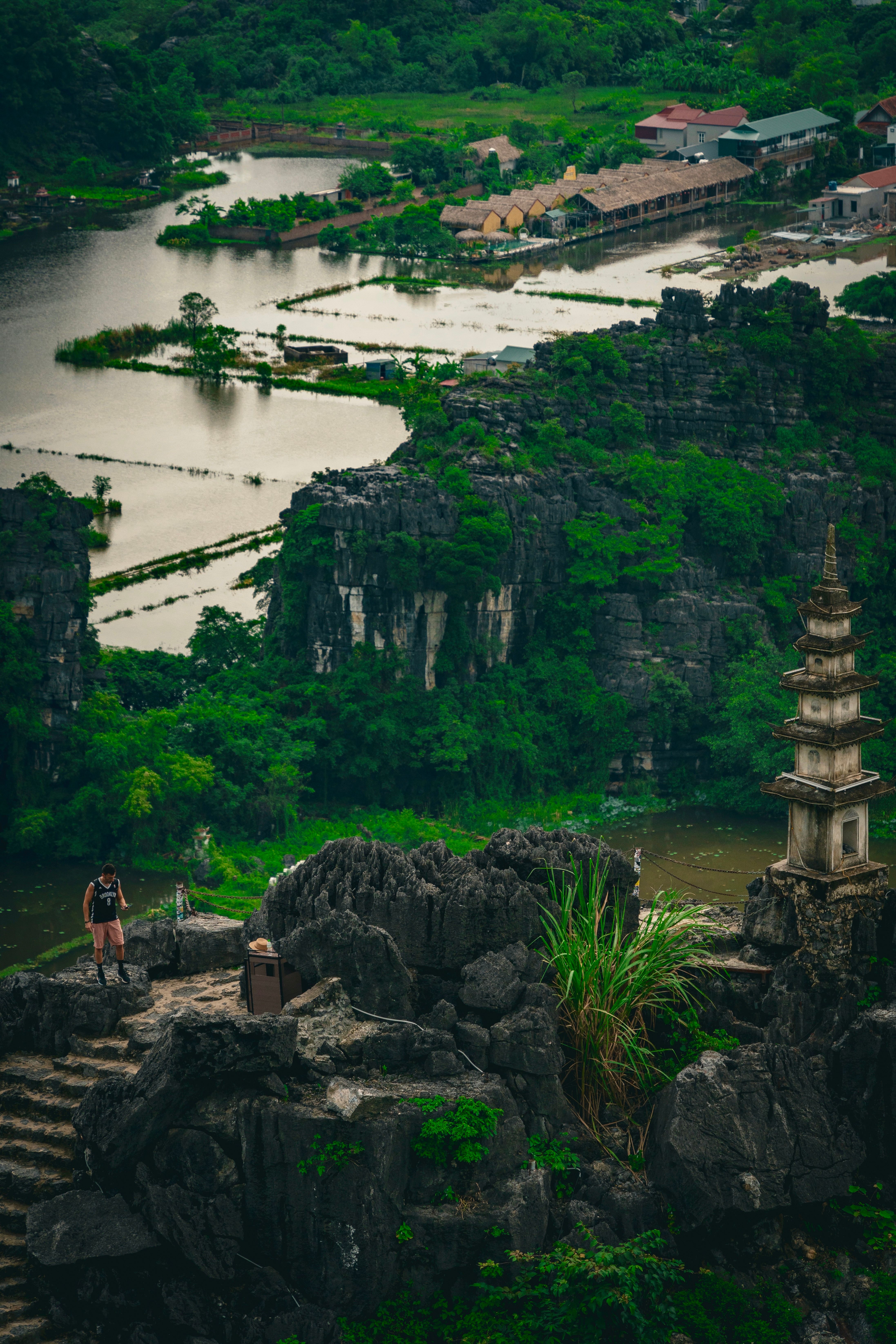 Majestic pagoda over lush Ninh Bình landscape, ideal for travel inspiration.