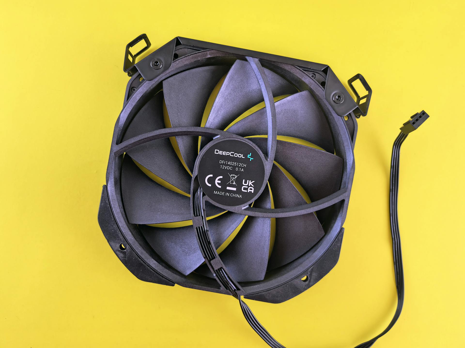 Computer Fan on Yellow Background