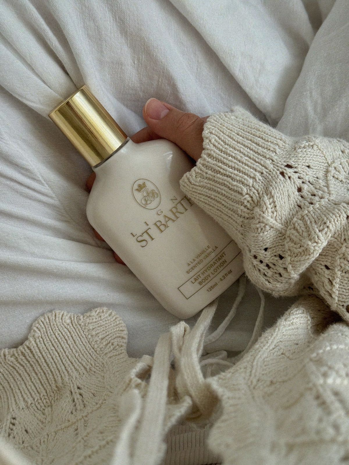 Woman holding body lotion