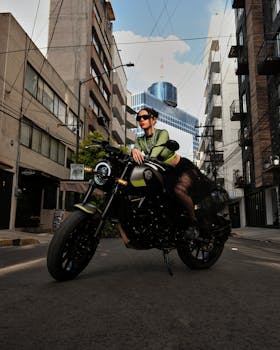 Stylish motorcyclist on city street in Ciudad de México. Urban adventure vibes.