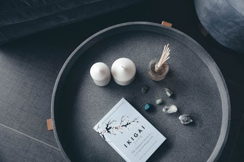 Photo of Candles, Stones, and Book 