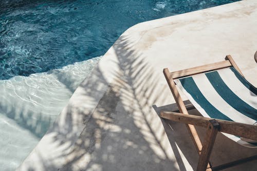 White and Green Striped Lounger Chair