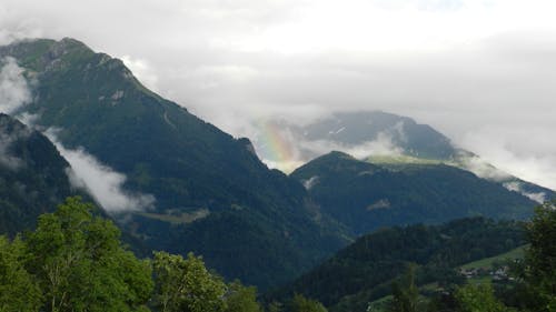 Rainbow in between Mountains