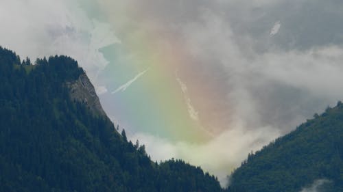 Free Green Mountain With Rainbow Stock Photo