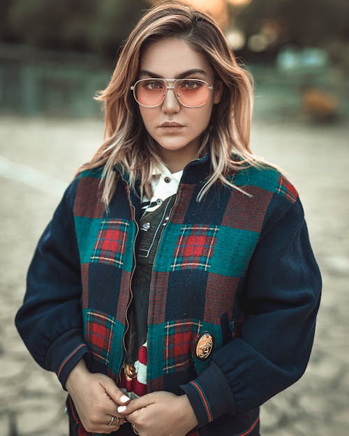 Woman In  Blue and Red Zip-up Jacket 