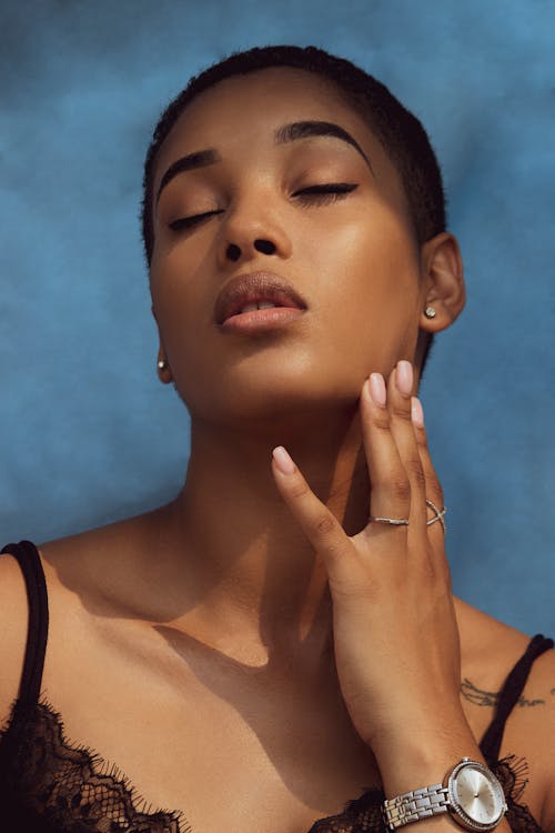 Close-Up Photo of a Closed Eyed Woman