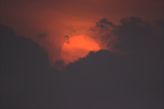 Red Sun with block cloud