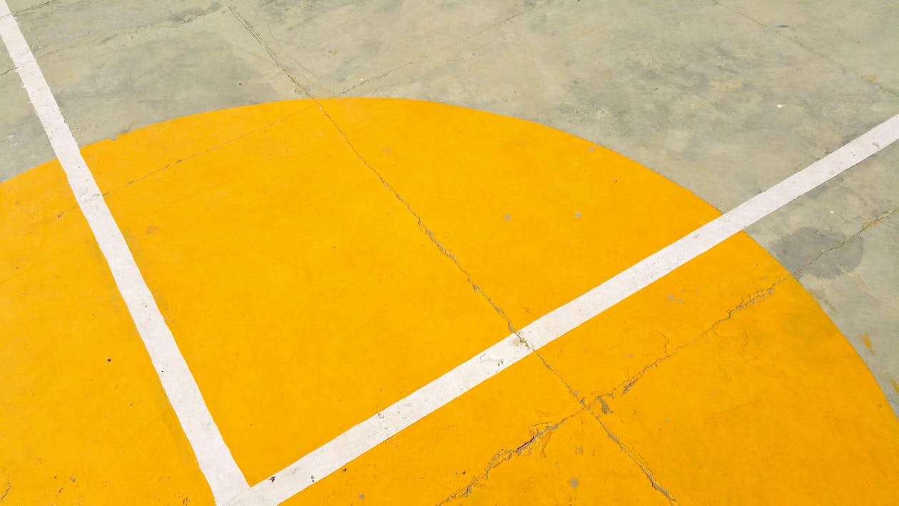 Free Gray Concrete Pavement With Yellow and White Paint Stock Photo