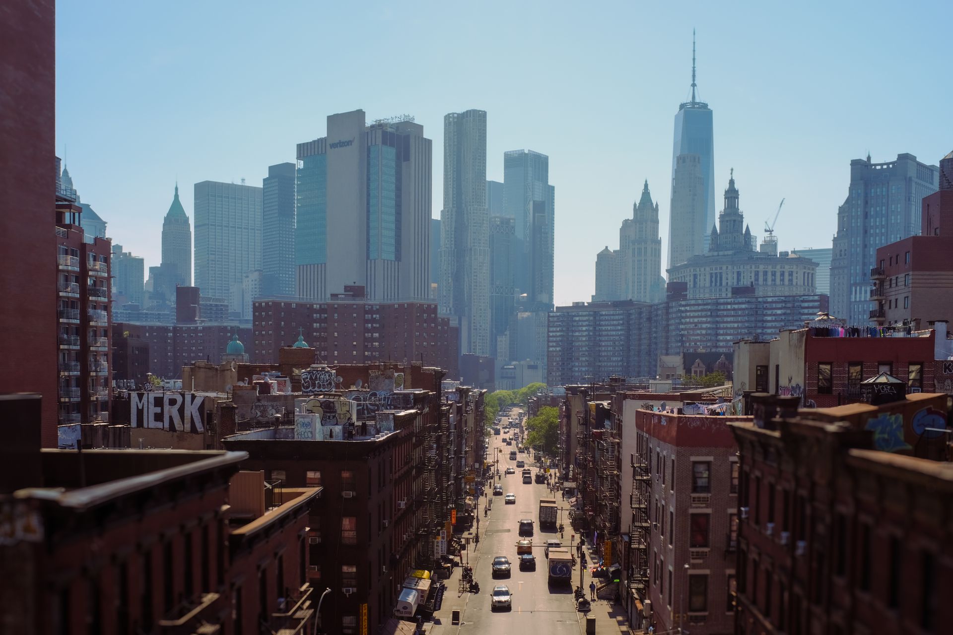 A stunning view of Manhattan showcasing skyscrapers and busy streets on a sunny day.