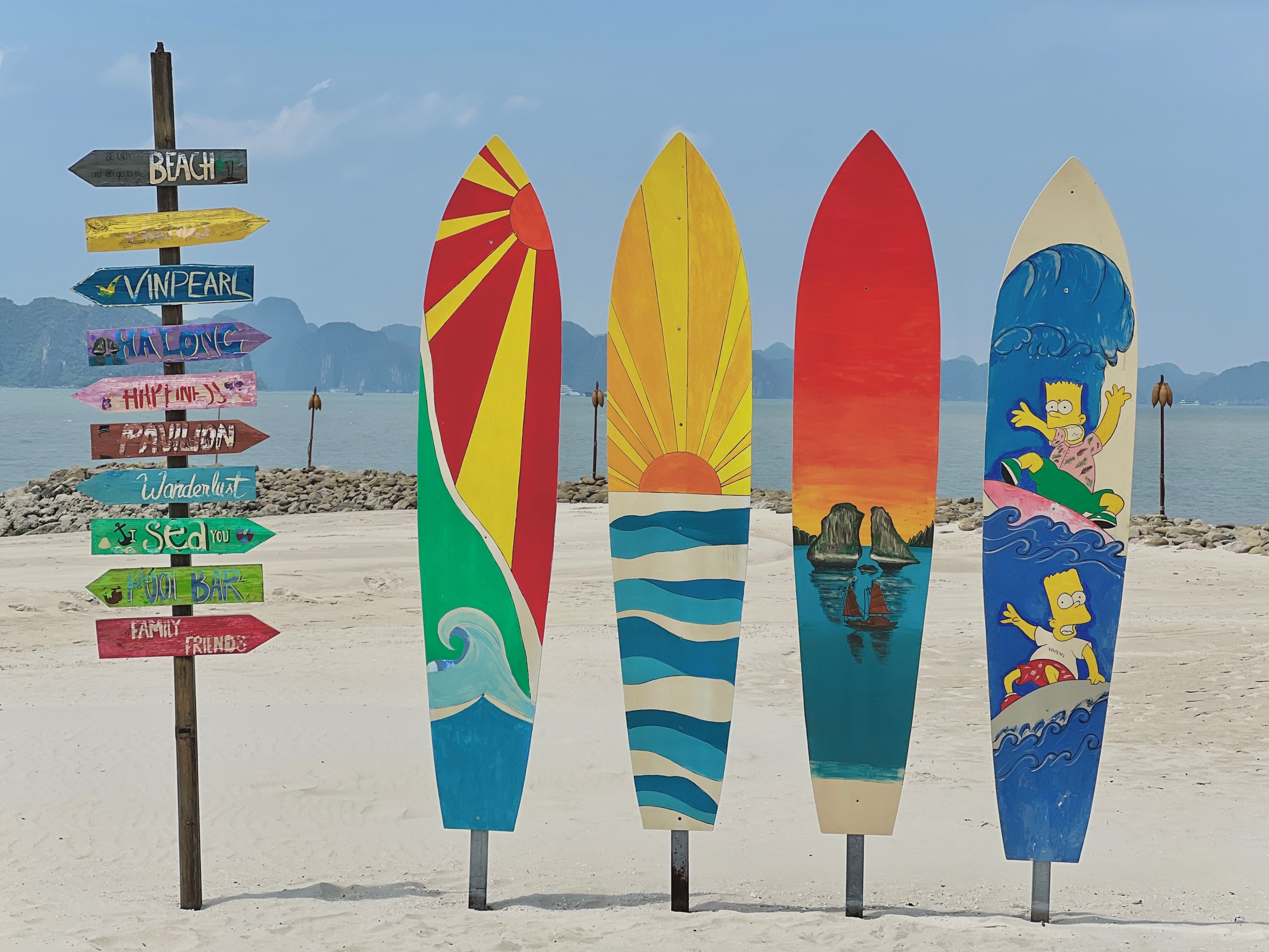 Direction Signs and Surfing Decoration Beach · Free Stock Photo