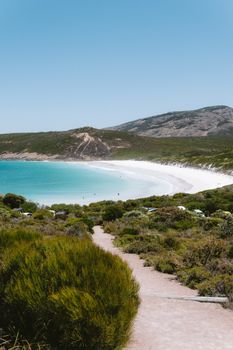 Breathtaking view of blue-turquoise waters and white sands at Esperance Beach, WA.