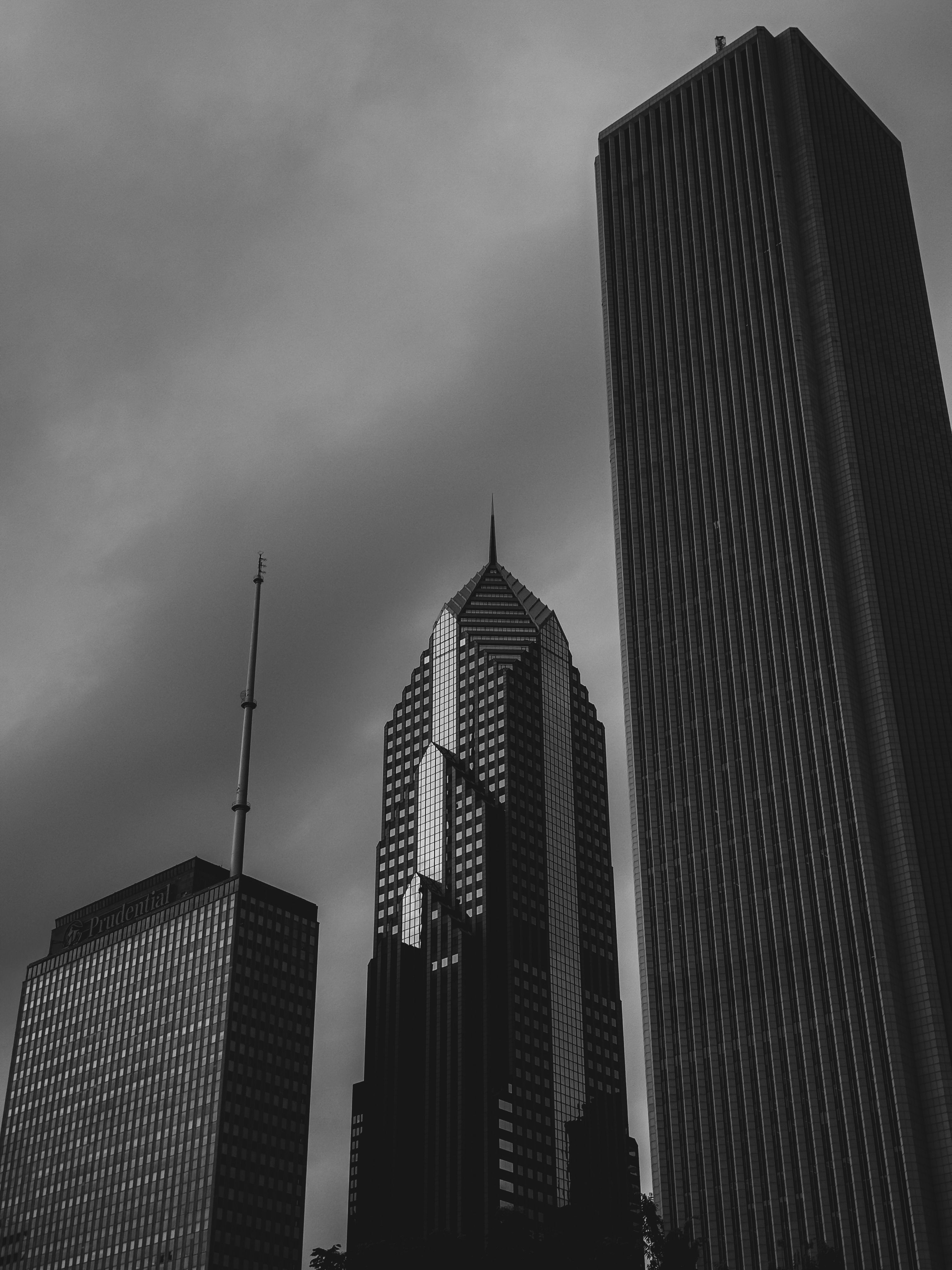 Black and white photo of tall buildings in the city · Free Stock Photo