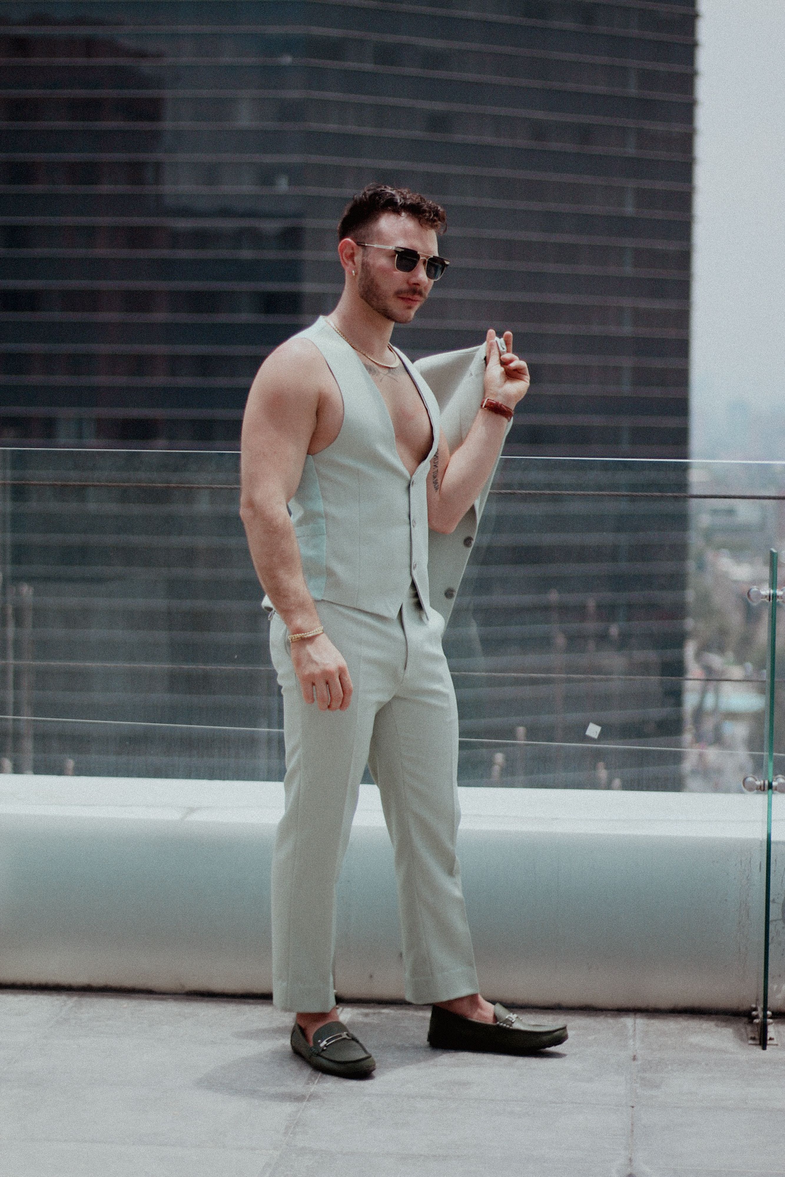 Man in Suit Standing on Rooftop · Free Stock Photo