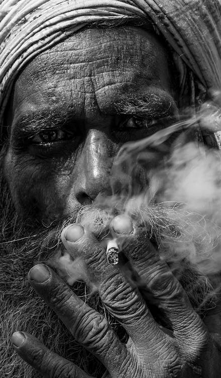 Old Man Smoking Cigarette