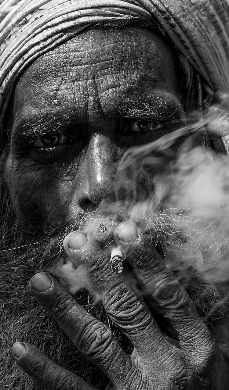 Old Man Smoking Cigarette