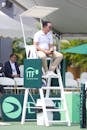 Tennis Official Sitting on Judge Tower