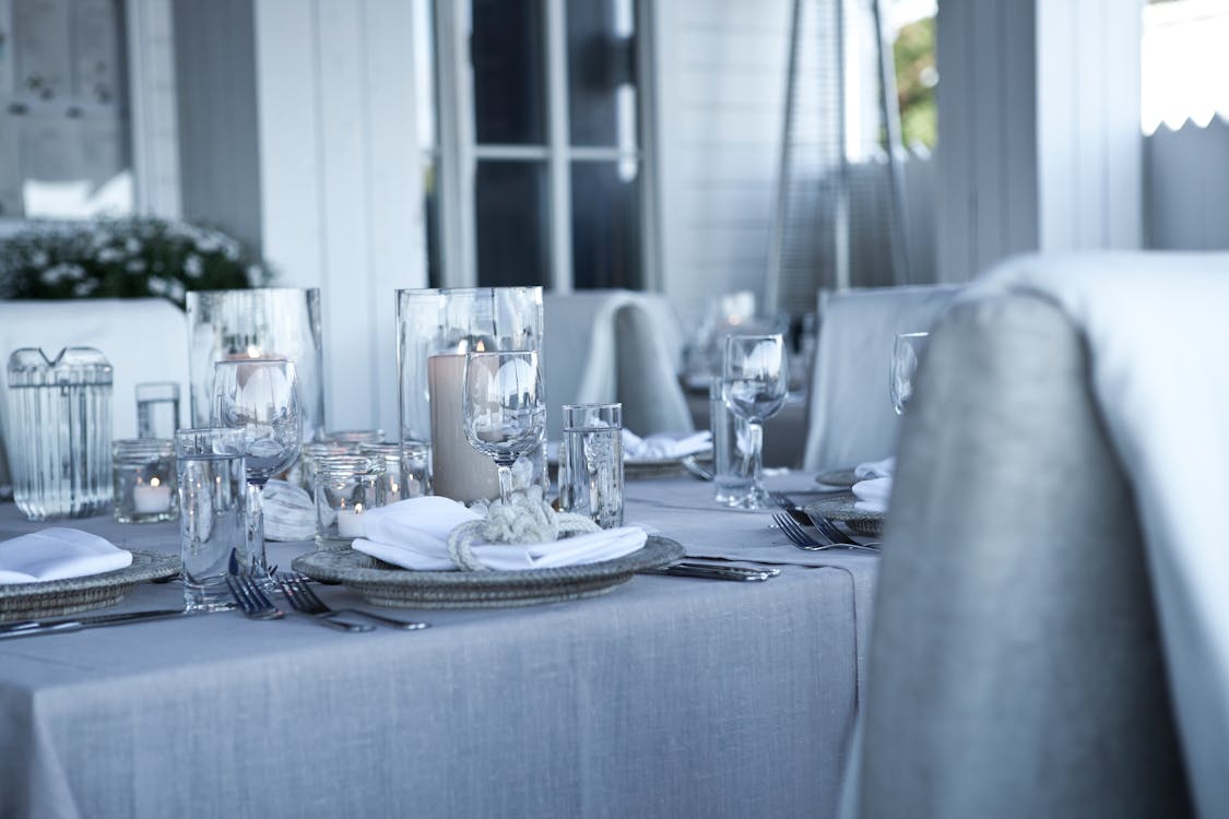 Clear Glass Dinnerwares on Gray Table