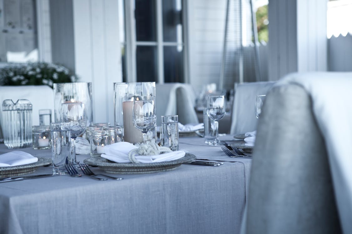 Free Clear Glass Dinnerwares on Gray Table Stock Photo