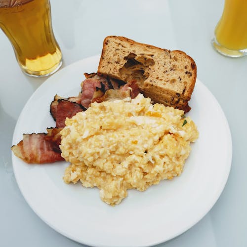 Free Cooked Food on White Ceramic Plate Close-up Photography Stock Photo