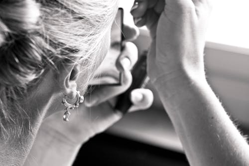 Grayscale Photography of Women's Earring