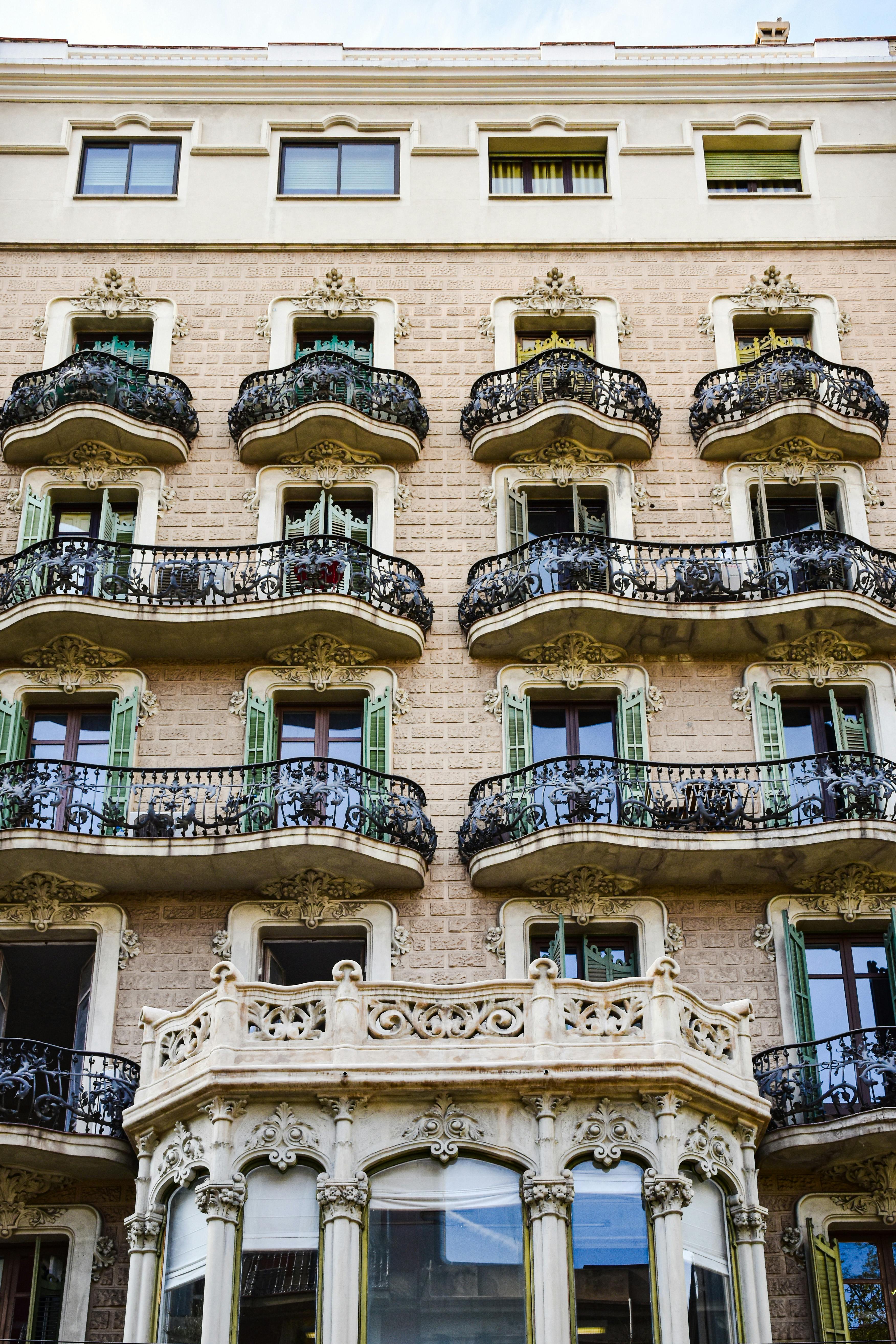 a building with balconies and balconies on the side