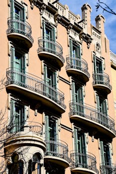 Art Nouveau architecture with ornate balconies in Barcelona, capturing urban elegance.
