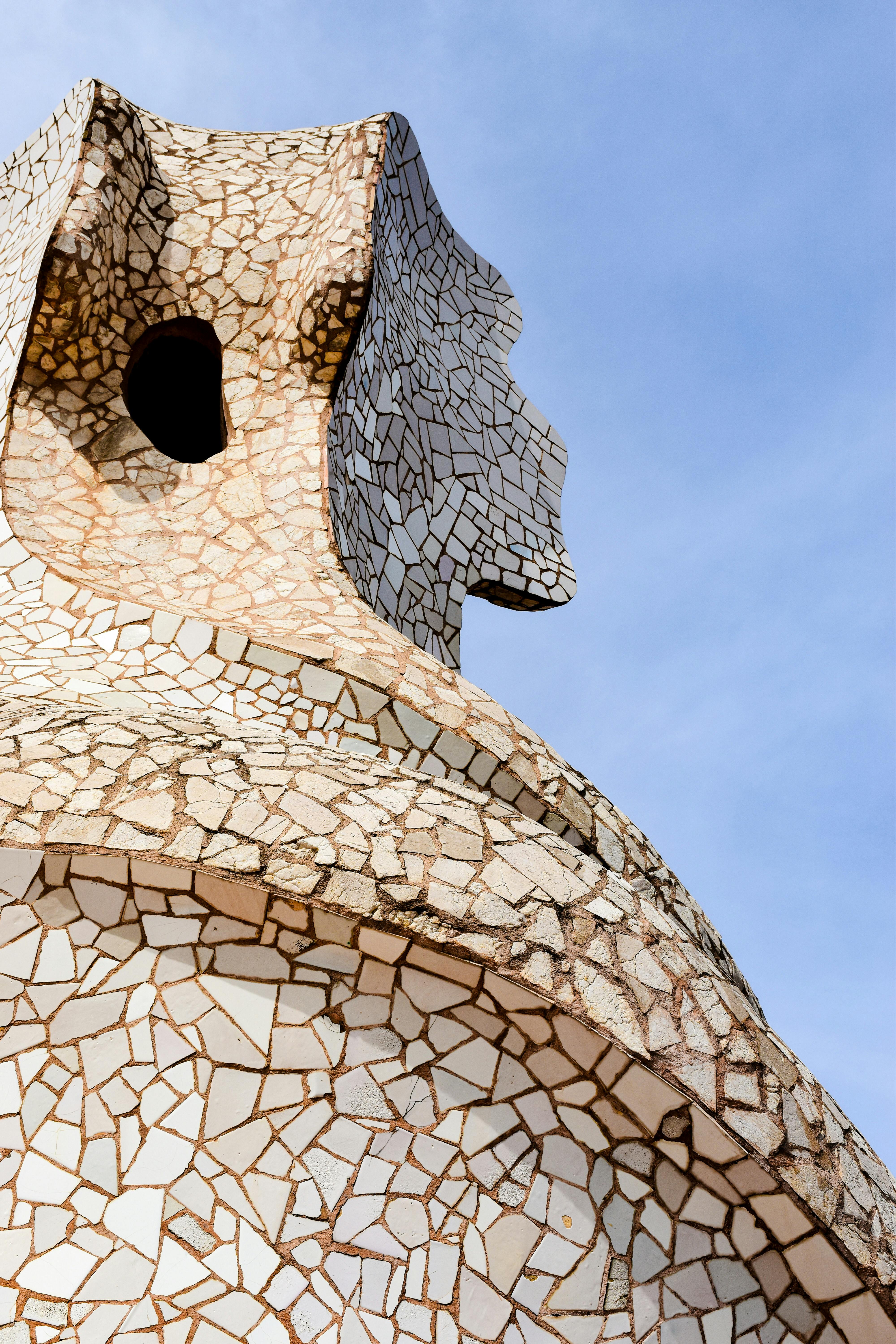 the top of a building with a mosaic design