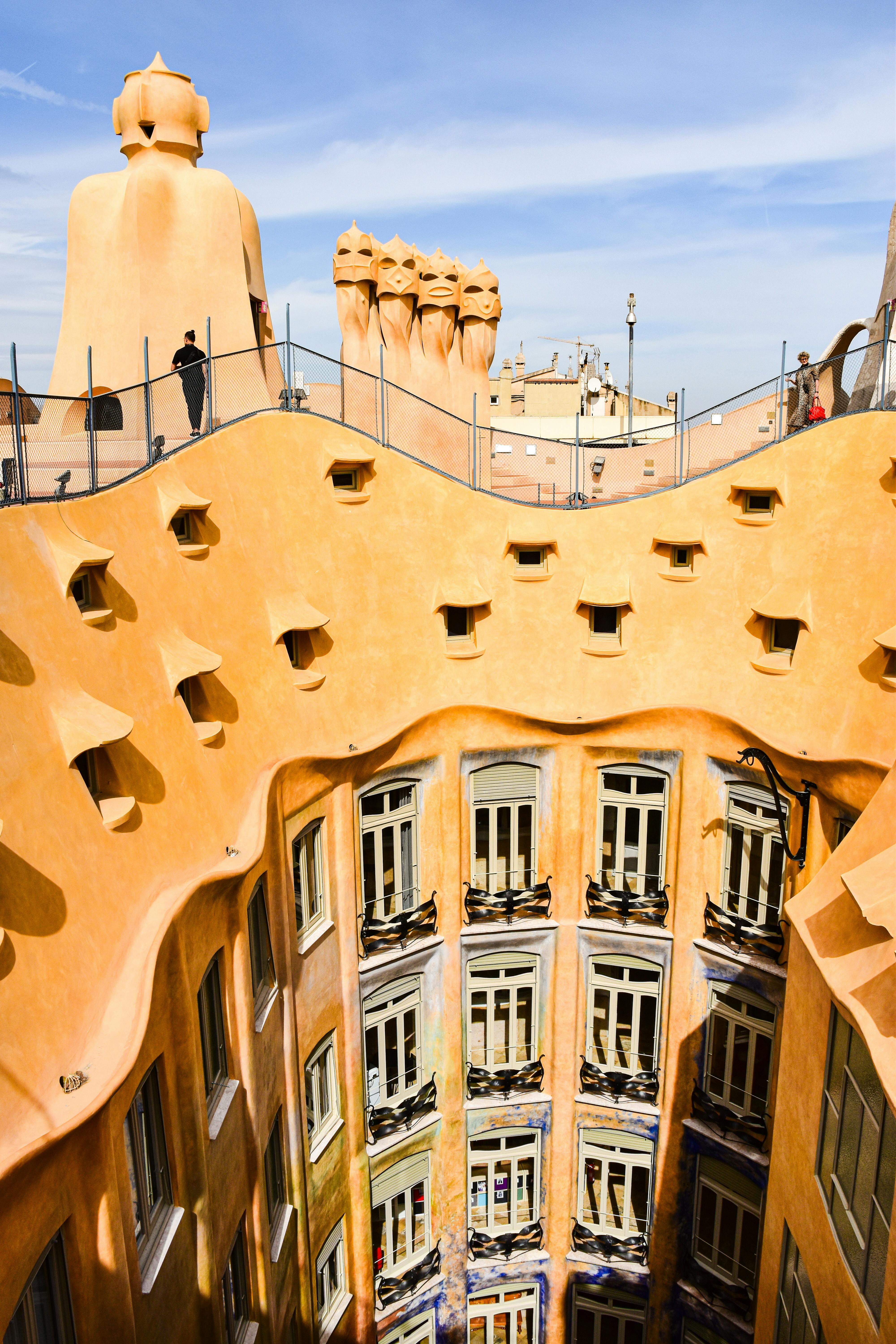 the roof of a building with many windows