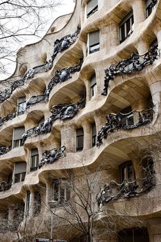 Detailed view of Casa Milà, showcasing Gaudí's unique architectural design in Barcelona, Spain.