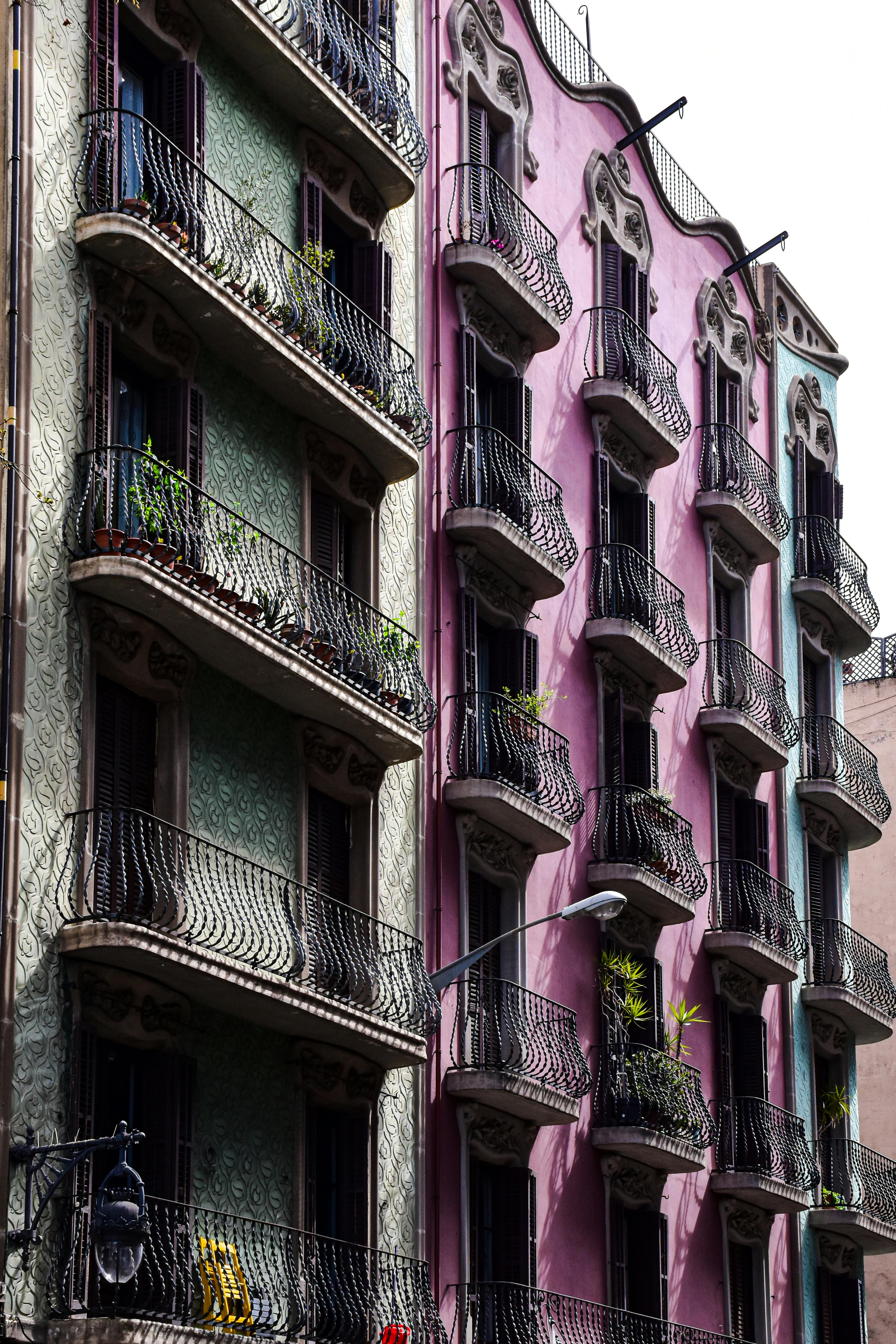 a colorful building with balconies and balconies