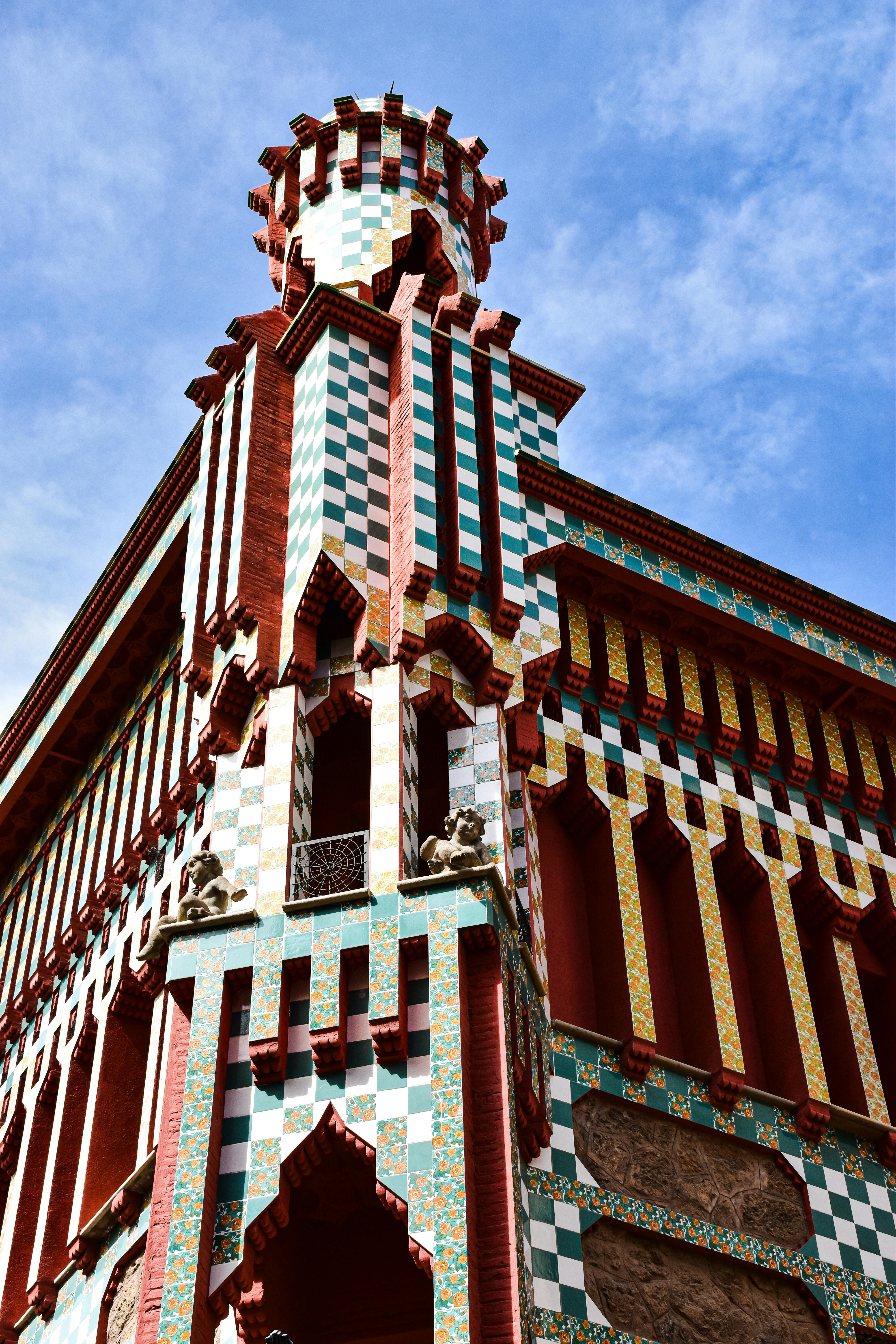 a colorful building with a clock on top