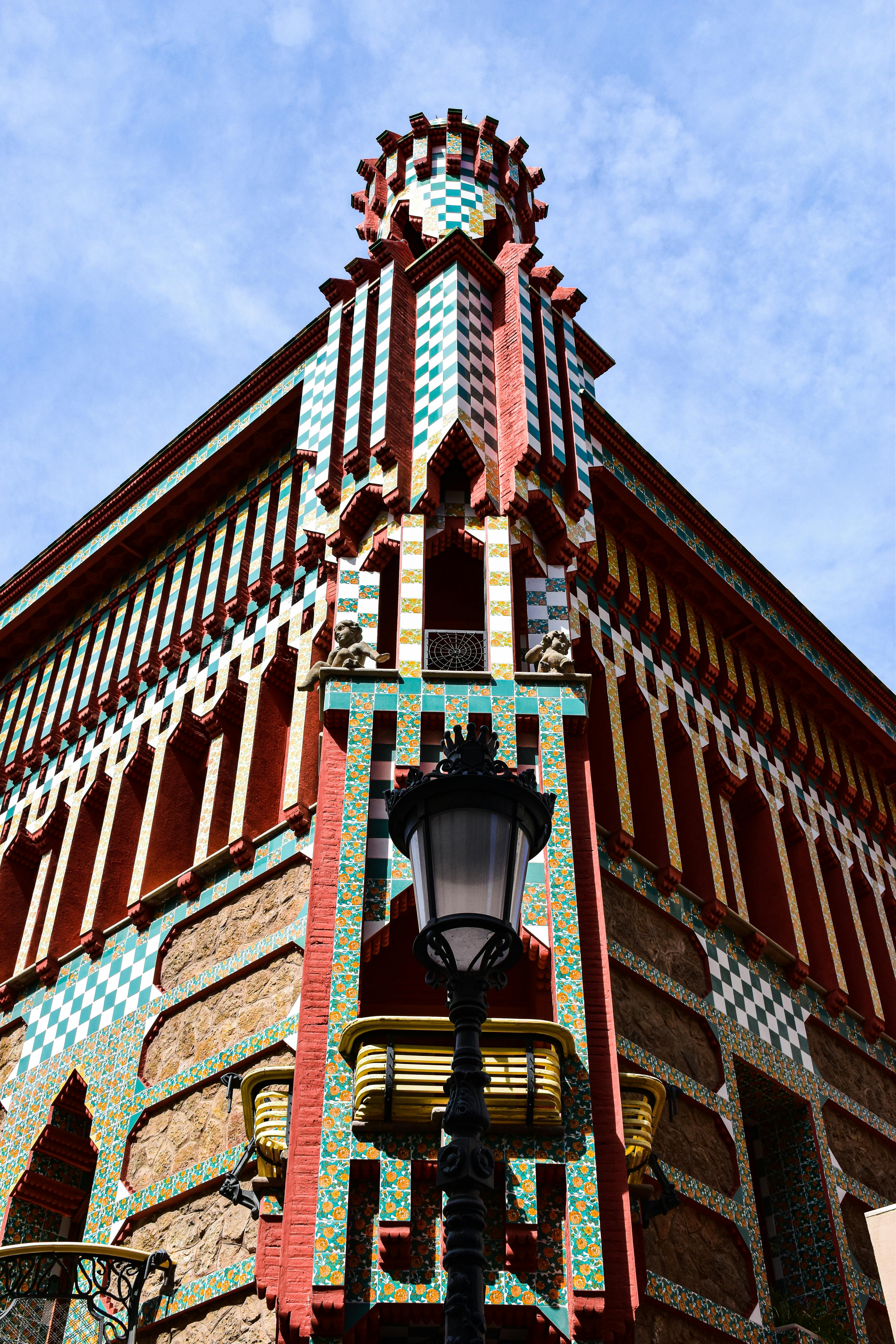 a clock on a building with a light on it