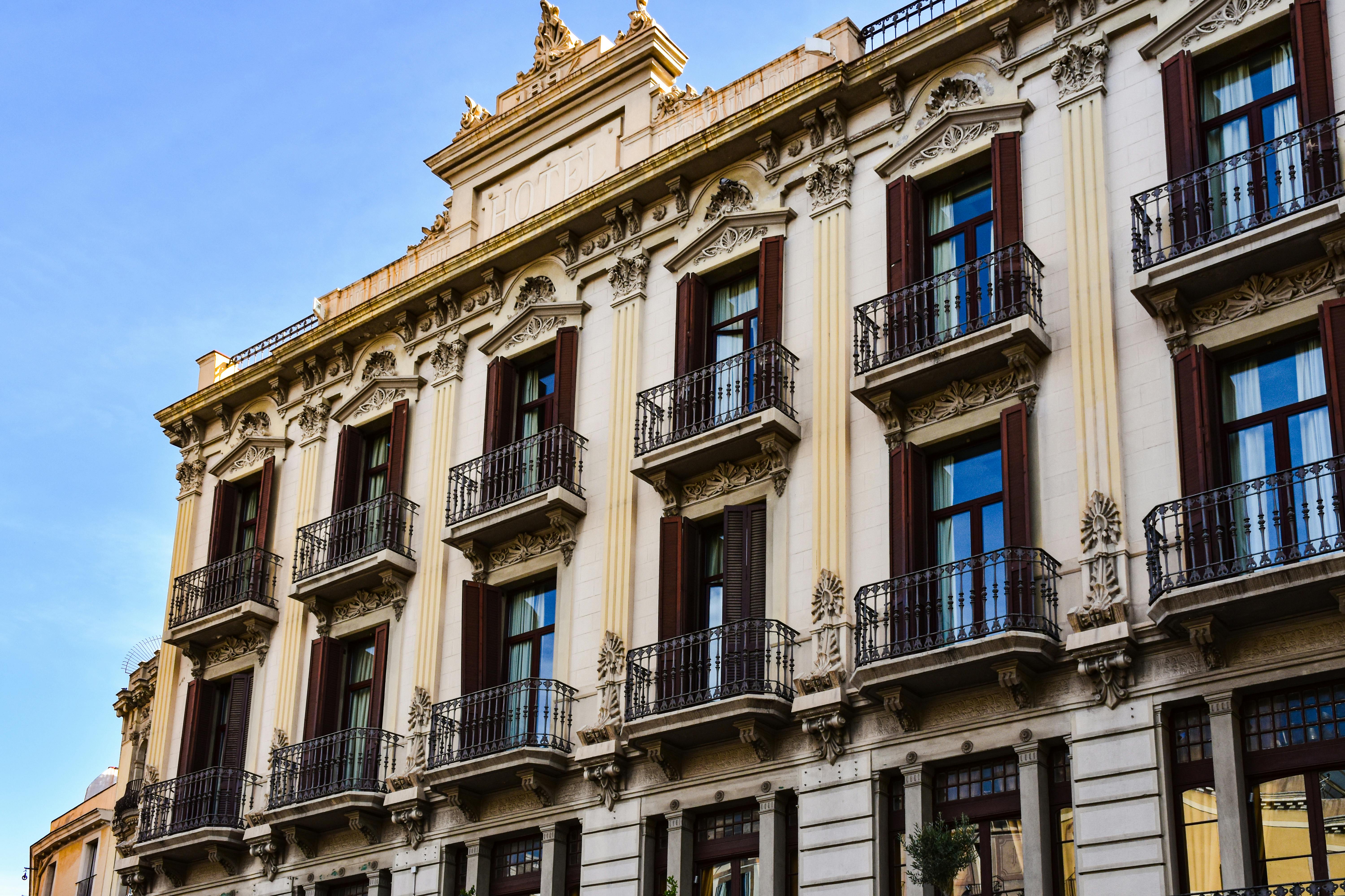 a building with balconies and balconies on the top