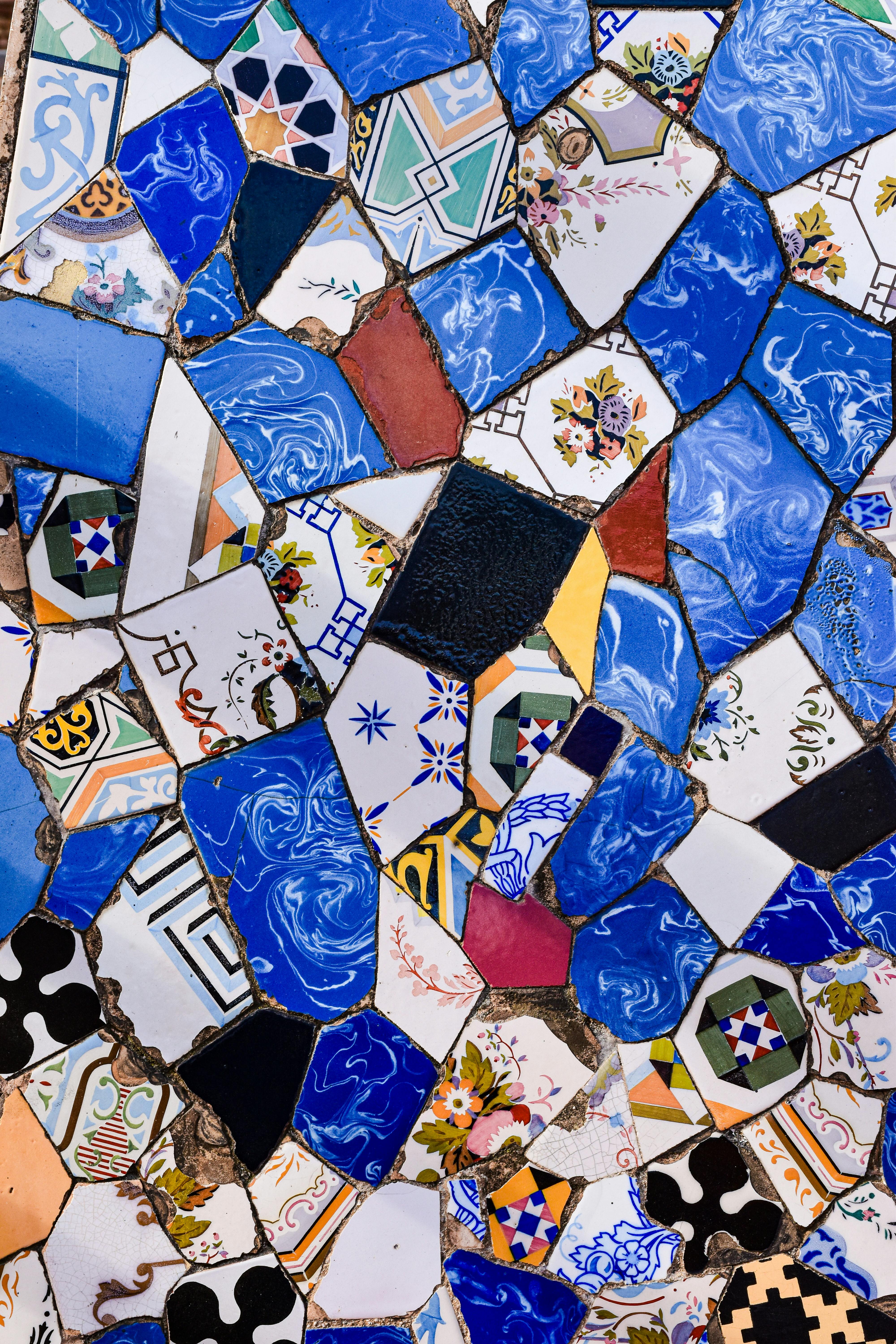 a mosaic tile with blue and white designs