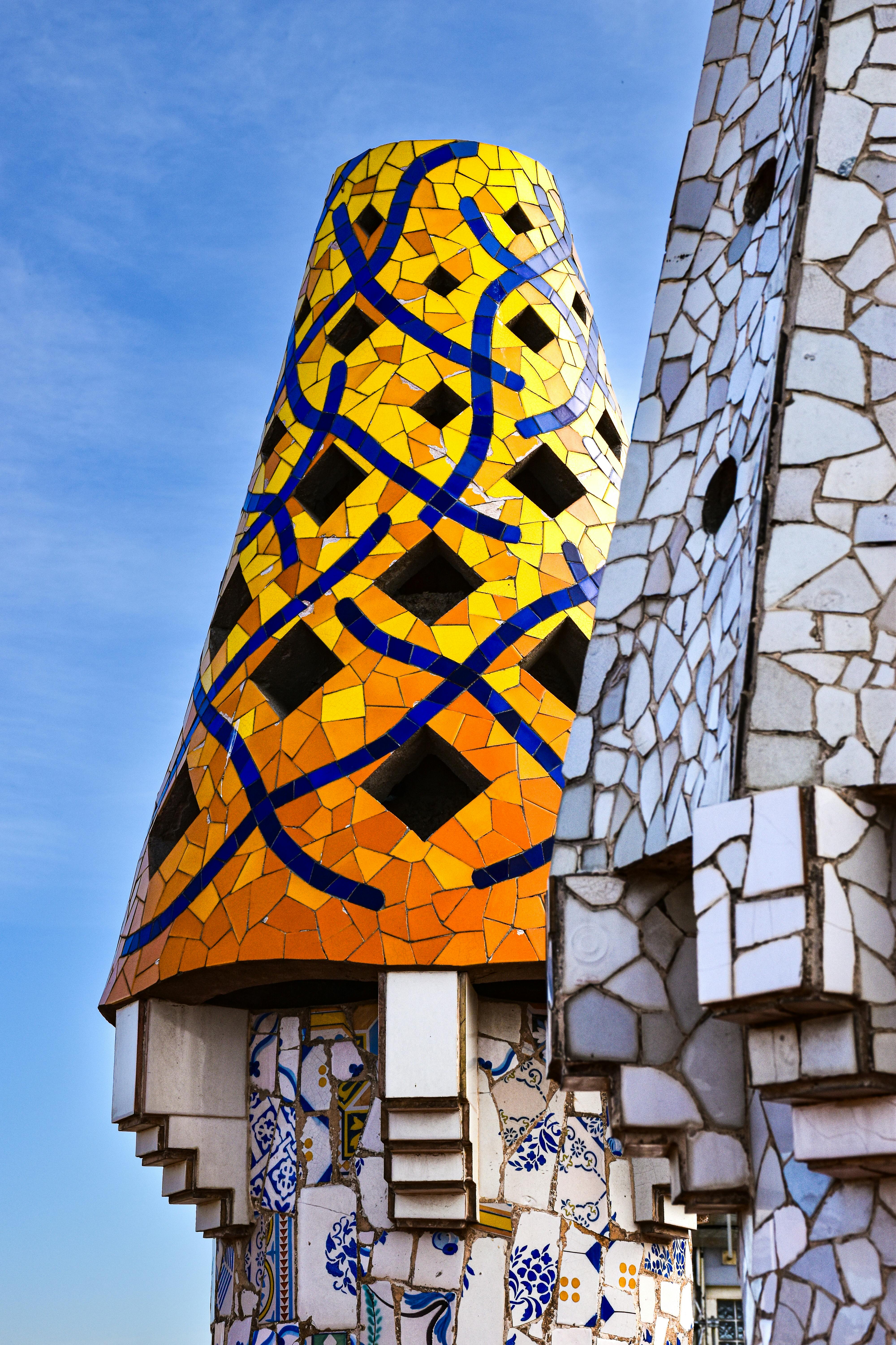 a colorful building with a blue sky in the background