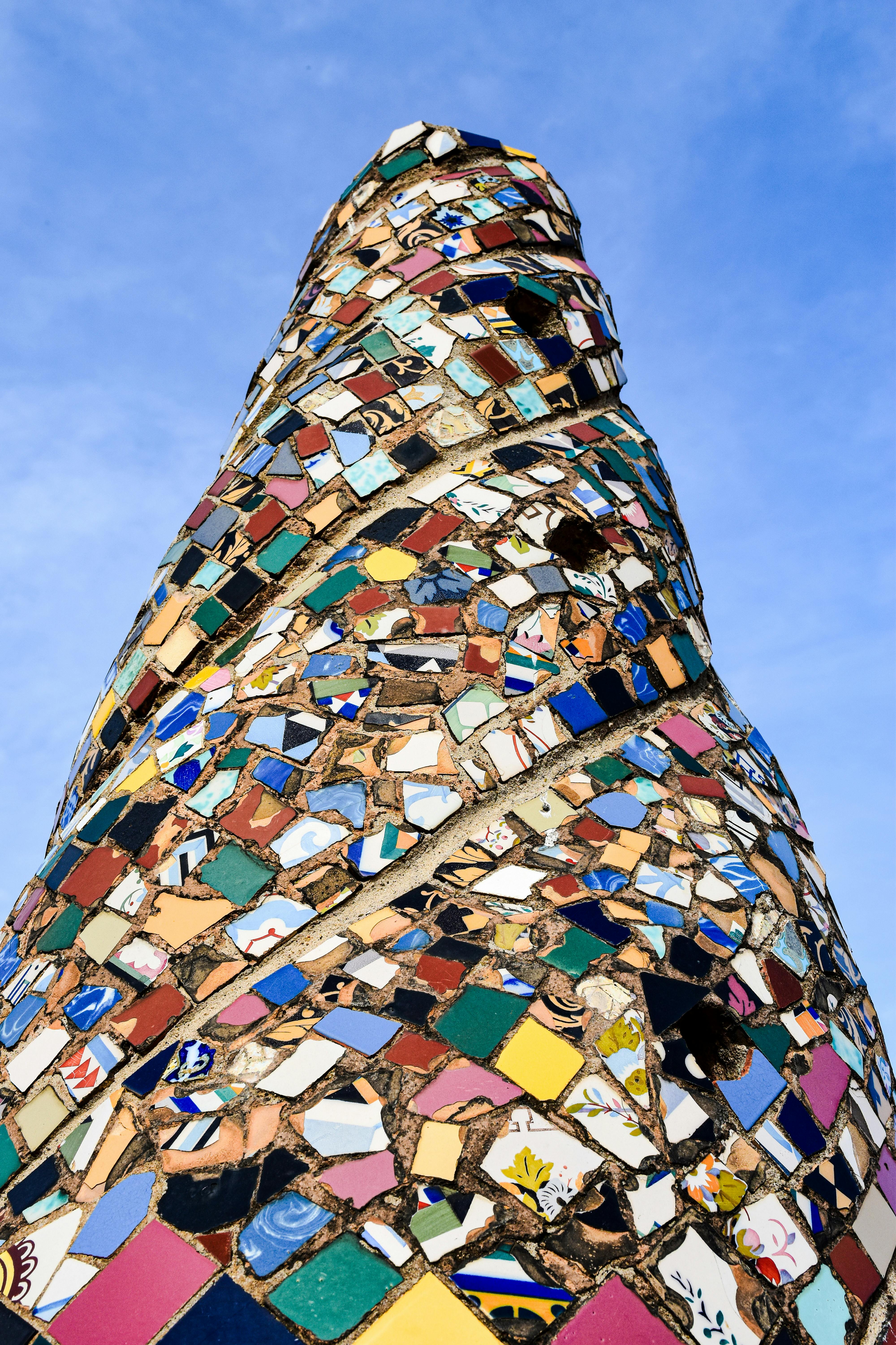 a tall tower with many colorful tiles on it