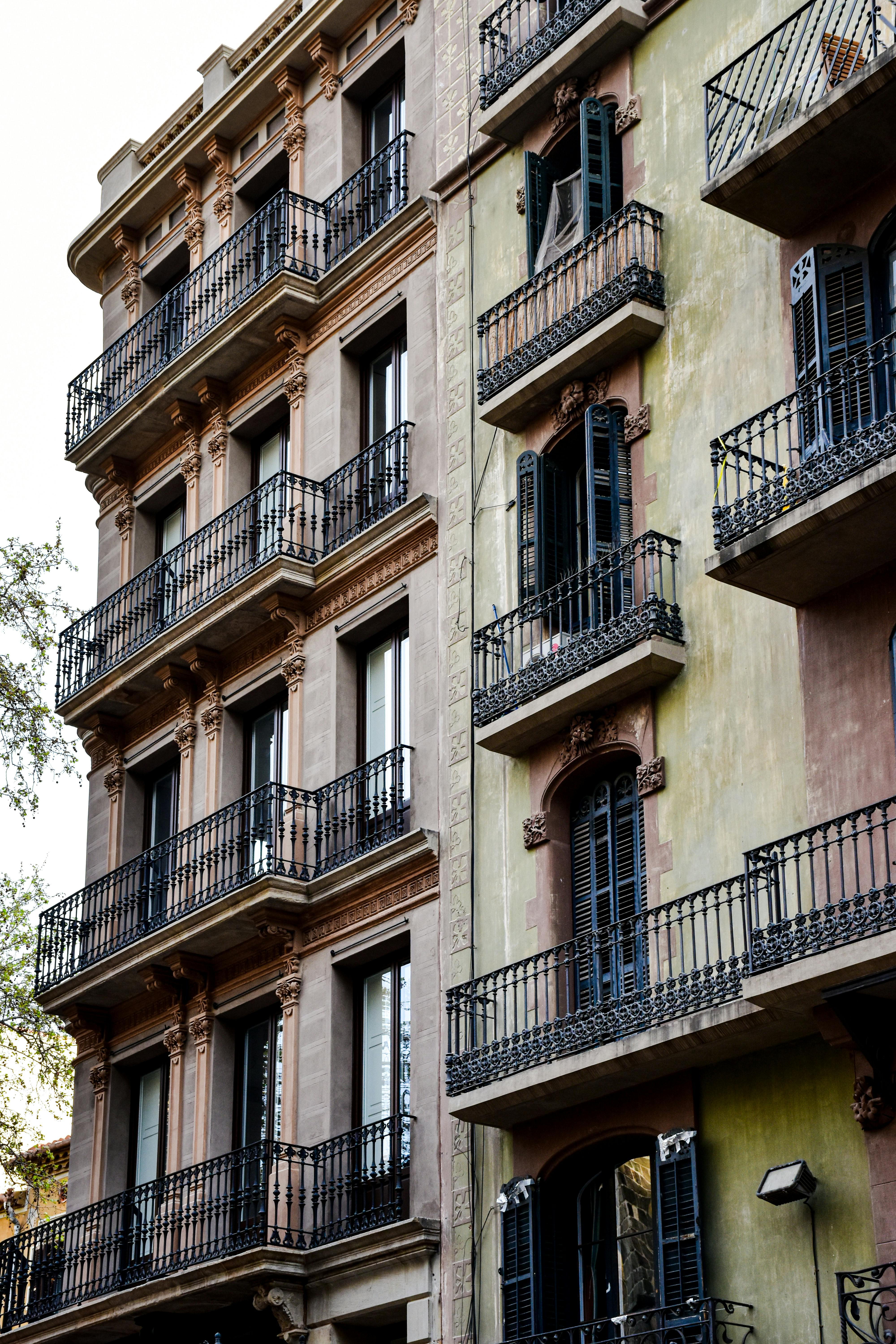 a building with balconies and balconies on the side