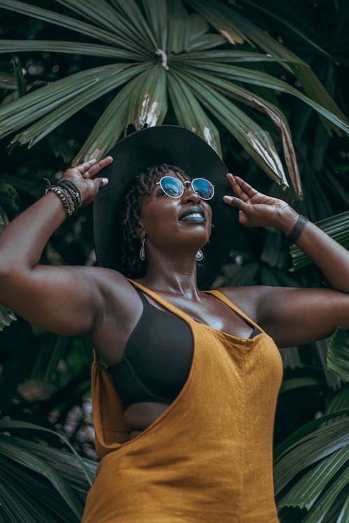 Free Photo Of Woman Wearing Yellow Top Stock Photo