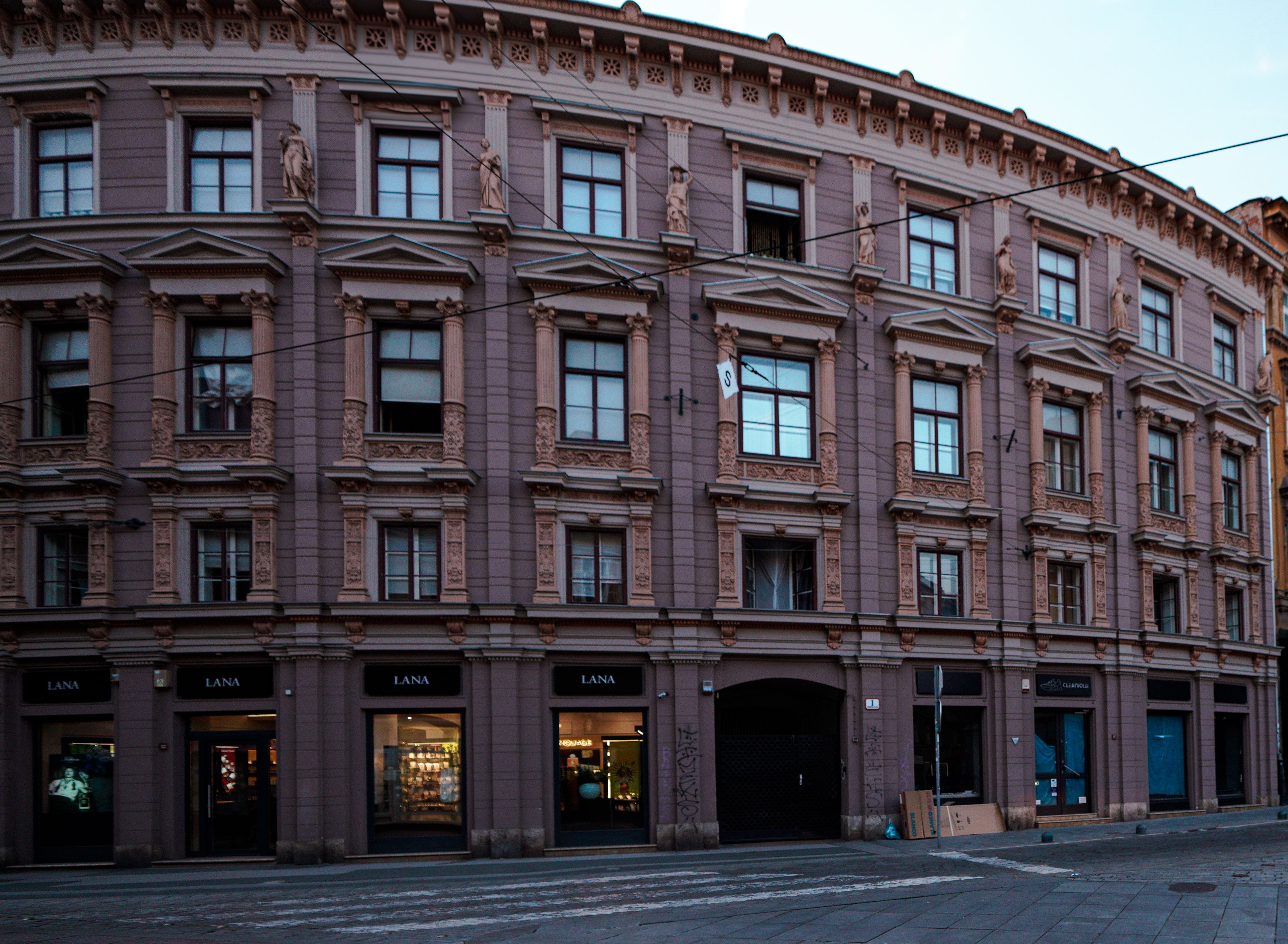 Beautifully detailed European building facade with ornate windows and classical architecture.