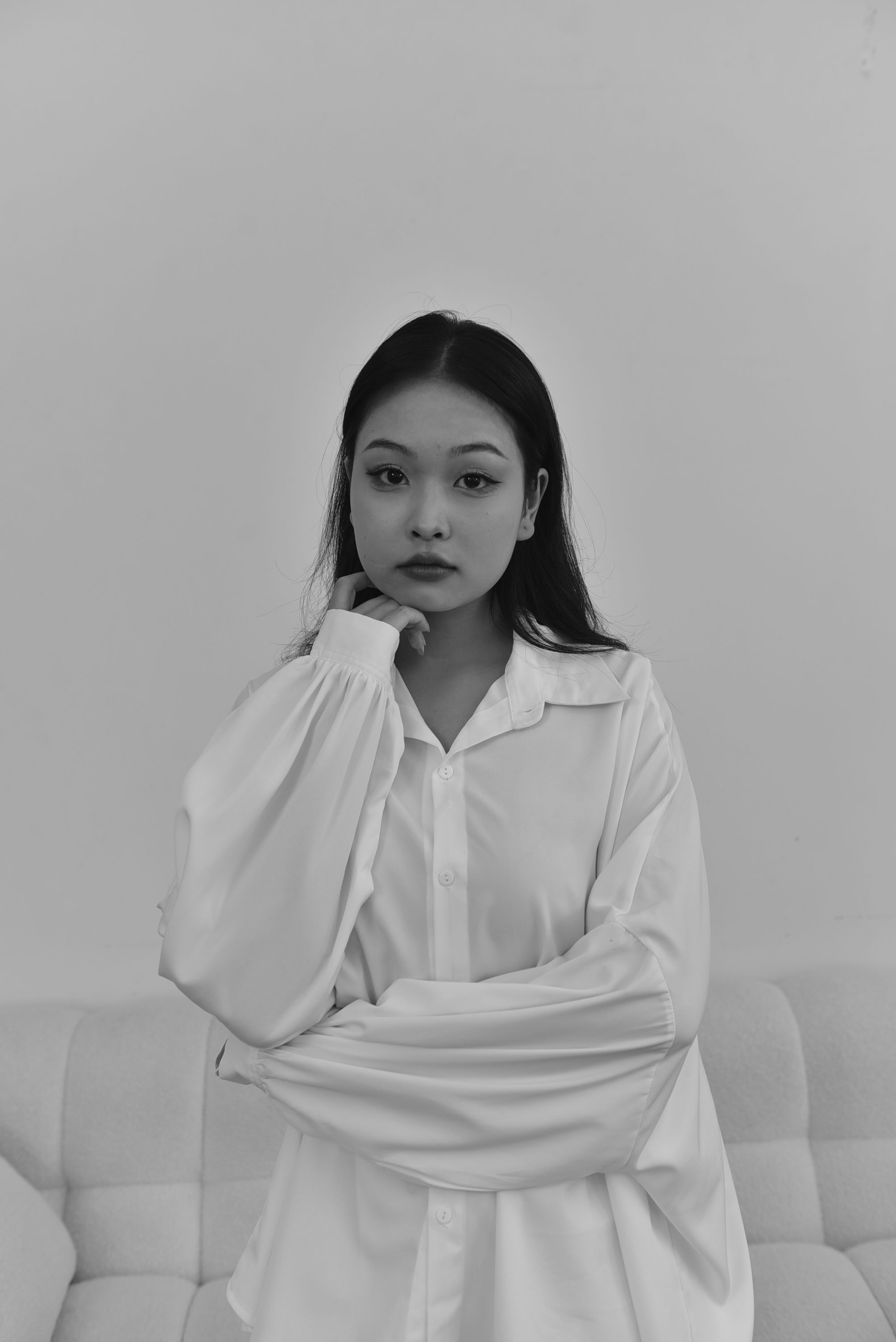 A woman in a white shirt posing for a photo · Free Stock Photo
