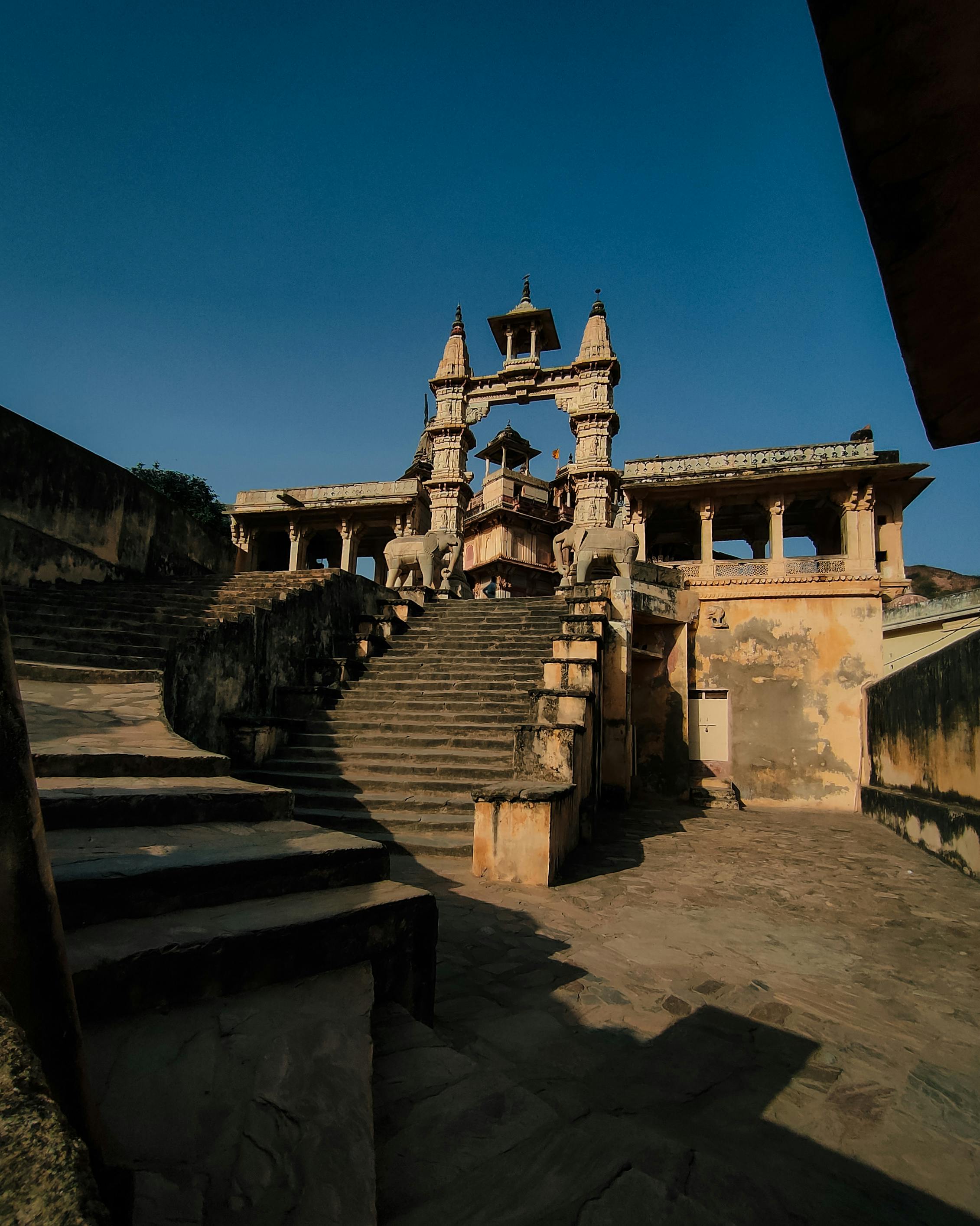 Explore the ancient temple architecture in Jaipur, Rajasthan, showcasing intricate designs and cultural heritage.