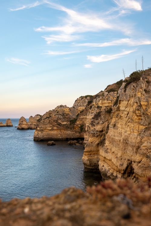 Free Breathtaking view of rocky cliffs and serene ocean near Lisbon, Portugal. Stock Photo